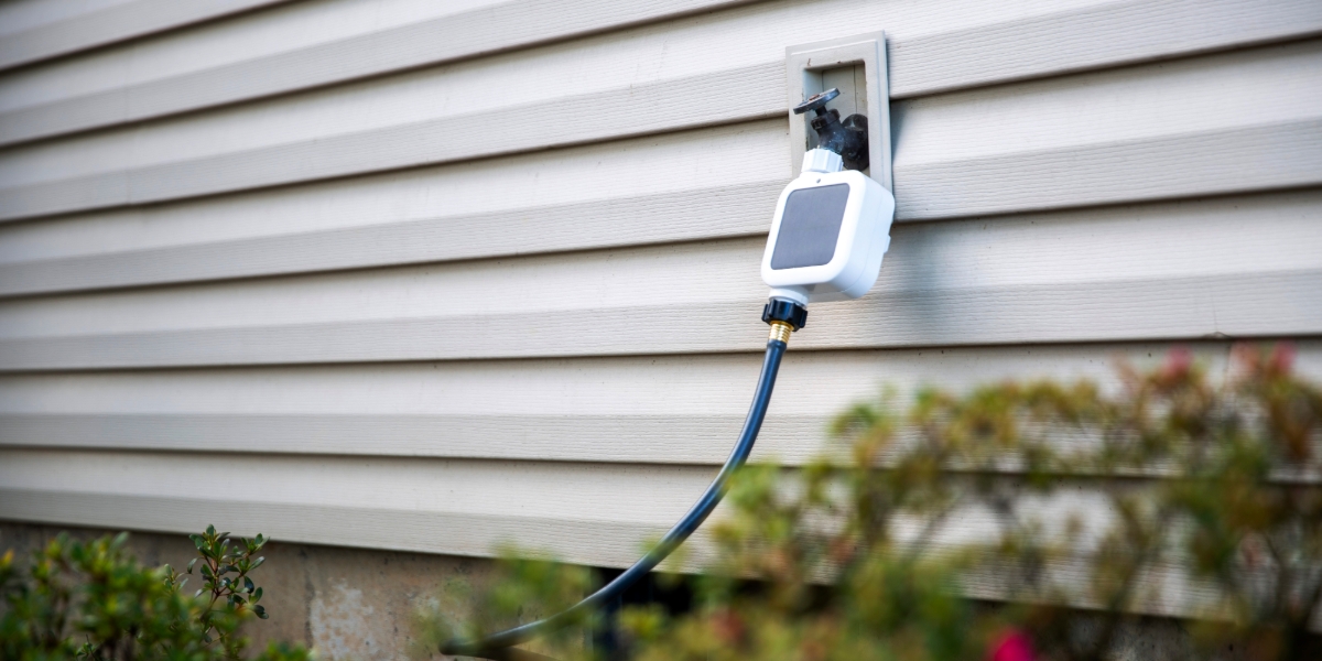 Netro Pixie timer is connected to an outdoor hose faucet. Watering your garden with smart care.